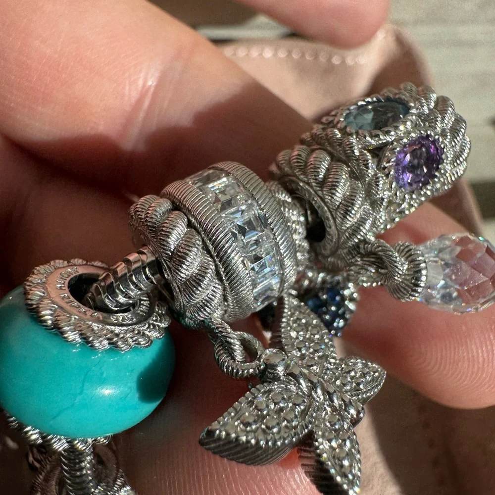 Judith Ripka Sterling Silver Charm bracelet with 13 charms and spacers - Picture 15 of 15